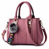 Embroidered Leather Messenger Bag