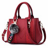 Embroidered Leather Messenger Bag