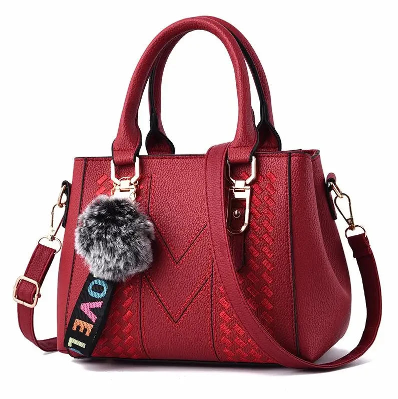 Embroidered Leather Messenger Bag