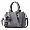 Embroidered Leather Messenger Bag