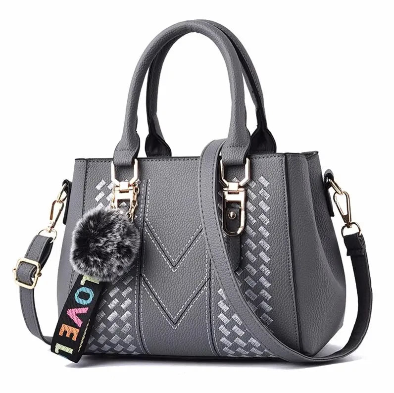Embroidered Leather Messenger Bag