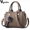 Embroidered Leather Messenger Bag
